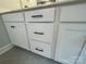 Bathroom with crisp white cabinets and modern black hardware at 4021 Grommet Ct, Matthews, NC 28105