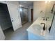 Bathroom featuring double vanity, stylish fixtures, and glass shower at 4021 Grommet Ct, Matthews, NC 28105
