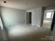 Bright bedroom with ample natural light at 4021 Grommet Ct, Matthews, NC 28105