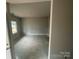 A spacious bedroom with a window for natural light at 4021 Grommet Ct, Matthews, NC 28105