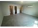 Spacious bedroom featuring doorways to other rooms and light from the window at 4021 Grommet Ct, Matthews, NC 28105