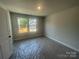 A spacious bedroom with natural light showcasing a calming and bright atmosphere at 4021 Grommet Ct, Matthews, NC 28105