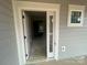 A home entryway featuring natural light streaming through front door and window at 4021 Grommet Ct, Matthews, NC 28105