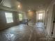 Upstairs hallway with carpet and windows providing natural light at 4021 Grommet Ct, Matthews, NC 28105