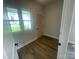 Mud room with natural lighting, and a door to the backyard at 4021 Grommet Ct, Matthews, NC 28105