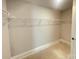 A spacious walk-in closet featuring ample shelving for organized storage solutions and easy access to belongings at 4021 Grommet Ct, Matthews, NC 28105