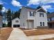 Charming two-story home with a detached garage and modern siding on a spacious lot at 4025 Grommet Ct, Matthews, NC 28105