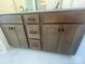 Double sink vanity with dark wood cabinets, drawers, and contemporary hardware in bathroom at 4025 Grommet Ct, Matthews, NC 28105