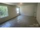 Neutral bedroom with plush carpet, natural light, and blank canvas awaiting personal touches at 4025 Grommet Ct, Matthews, NC 28105
