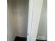 A modest-sized closet with a rail for hanging clothes offering practical storage space at 4025 Grommet Ct, Matthews, NC 28105