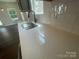 A modern kitchen sink with stylish faucet and attractive countertop providing a sleek and functional space at 4025 Grommet Ct, Matthews, NC 28105