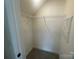 Bright walk-in closet offering wire shelving for optimal storage solutions at 4025 Grommet Ct, Matthews, NC 28105