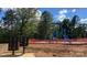 Playground with slides and a fenced area, enhancing the appeal for families in the community at 4033 Grommet Ct, Matthews, NC 28105
