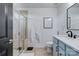 Modern bathroom showcasing a glass enclosed shower and sleek vanity with elegant decor at 4038 Zilker Park Dr, Charlotte, NC 28217
