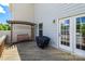 Cozy deck with a wooden swing and space for grilling, perfect for outdoor relaxation at 4038 Zilker Park Dr, Charlotte, NC 28217