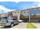 Rear exterior of townhomes with decks and car garages; convenient modern living at 4038 Zilker Park Dr, Charlotte, NC 28217