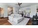 Open-concept living room showcasing a staircase, dining area, and an adjacent kitchen at 4038 Zilker Park Dr, Charlotte, NC 28217