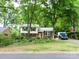 Charming two-story home with a well-manicured front yard and driveway at 4315 Chandworth Rd, Charlotte, NC 28210