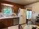 Functional kitchen with stainless steel dishwasher and refrigerator, plus a cozy breakfast nook at 4315 Chandworth Rd, Charlotte, NC 28210