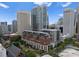 Stunning aerial view showcasing the building's modern architecture, nestled amidst the city skyline at 435 S Tryon St # 601, Charlotte, NC 28202