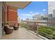 Inviting balcony offers city views with comfortable seating, ideal for enjoying the urban landscape at 435 S Tryon St # 601, Charlotte, NC 28202