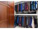 Spacious walk-in closet with custom shelving and ample storage space at 435 S Tryon St # 601, Charlotte, NC 28202