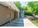 View of the dock with stairs leading to the house, boat storage, and waterfront access at 46827 Tall Whit Rd, New London, NC 28127