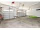 A spacious garage with three bays, providing plenty of room for vehicles and storage at 46827 Tall Whit Rd, New London, NC 28127