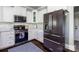 Well-equipped kitchen with stainless steel appliances, sleek countertops, and ample cabinet space at 46827 Tall Whit Rd, New London, NC 28127