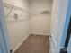 Walk-in closet with carpet and white wire shelving at 5031 Burnwald Ct, Fort Mill, SC 29715