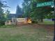 Community entrance sign for Saxon Place Drive with landscaped surroundings at 5031 Burnwald Ct, Fort Mill, SC 29715
