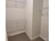 Walk-in closet with wire shelving for organized storage in a neutral color scheme at 5031 Burnwald Ct, Fort Mill, SC 29715