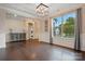Bright living room features hardwood floors, natural light, and stylish decor at 5105 Paisano Ln, Waxhaw, NC 28173