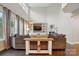 Comfortable living room with soaring ceilings, fireplace, and wall-to-wall shelving at 5105 Paisano Ln, Waxhaw, NC 28173