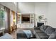 Spacious living room boasts a fireplace and built-in shelving for cozy elegance at 5105 Paisano Ln, Waxhaw, NC 28173