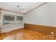 Bright dining room with wood floors and large windows bringing in natural light at 733 Osteen Rd, York, SC 29745