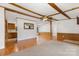 Open concept living room featuring beautiful wood floors and wood ceiling beams at 733 Osteen Rd, York, SC 29745