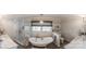 Full bathroom featuring double sink vanity, separate shower, and large clawfoot tub at 8005 Island View Ct, Denver, NC 28037