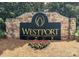 The Westport Club community sign is made of stone and has a black and gold logo and lettering at 8005 Island View Ct, Denver, NC 28037