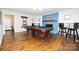 Aesthetic game room with a pool table, fireplace, and charming decor creating a fun atmosphere at 8005 Island View Ct, Denver, NC 28037