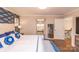Comfortable primary bedroom with hardwood floors and a serene bathroom view at 8005 Island View Ct, Denver, NC 28037