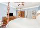 Elegant main bedroom with a four-poster bed, hardwood floors, and ample closet space at 8033 Pawleys Ct, Fort Mill, SC 29707