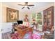Well-lit office with a large window, elegant desk, and ornate decor, perfect for a home workspace at 8033 Pawleys Ct, Fort Mill, SC 29707