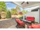 Covered patio with cozy seating, perfect for outdoor relaxation and entertaining at 8033 Pawleys Ct, Fort Mill, SC 29707