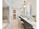 Elegant bathroom featuring a walk-in shower, vanity area, and a well-organized walk-in closet at 8108 Farm Crossing Ln # 26, Huntersville, NC 28078