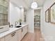 Chic butler's pantry featuring modern cabinetry, quartz countertops, and a convenient sink area at 8108 Farm Crossing Ln # 26, Huntersville, NC 28078