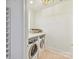 Convenient laundry room with modern washer and dryer, countertops, and storage at 8108 Farm Crossing Ln # 26, Huntersville, NC 28078