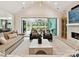 Spacious living room with vaulted ceiling offers an open floor plan and access to the porch at 8108 Farm Crossing Ln # 26, Huntersville, NC 28078