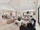 Spacious open-concept living room with a clear view of the kitchen and dining area at 8108 Farm Crossing Ln # 26, Huntersville, NC 28078