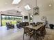 This covered porch offers outdoor dining and seating areas with scenic views of the property at 8108 Farm Crossing Ln # 26, Huntersville, NC 28078